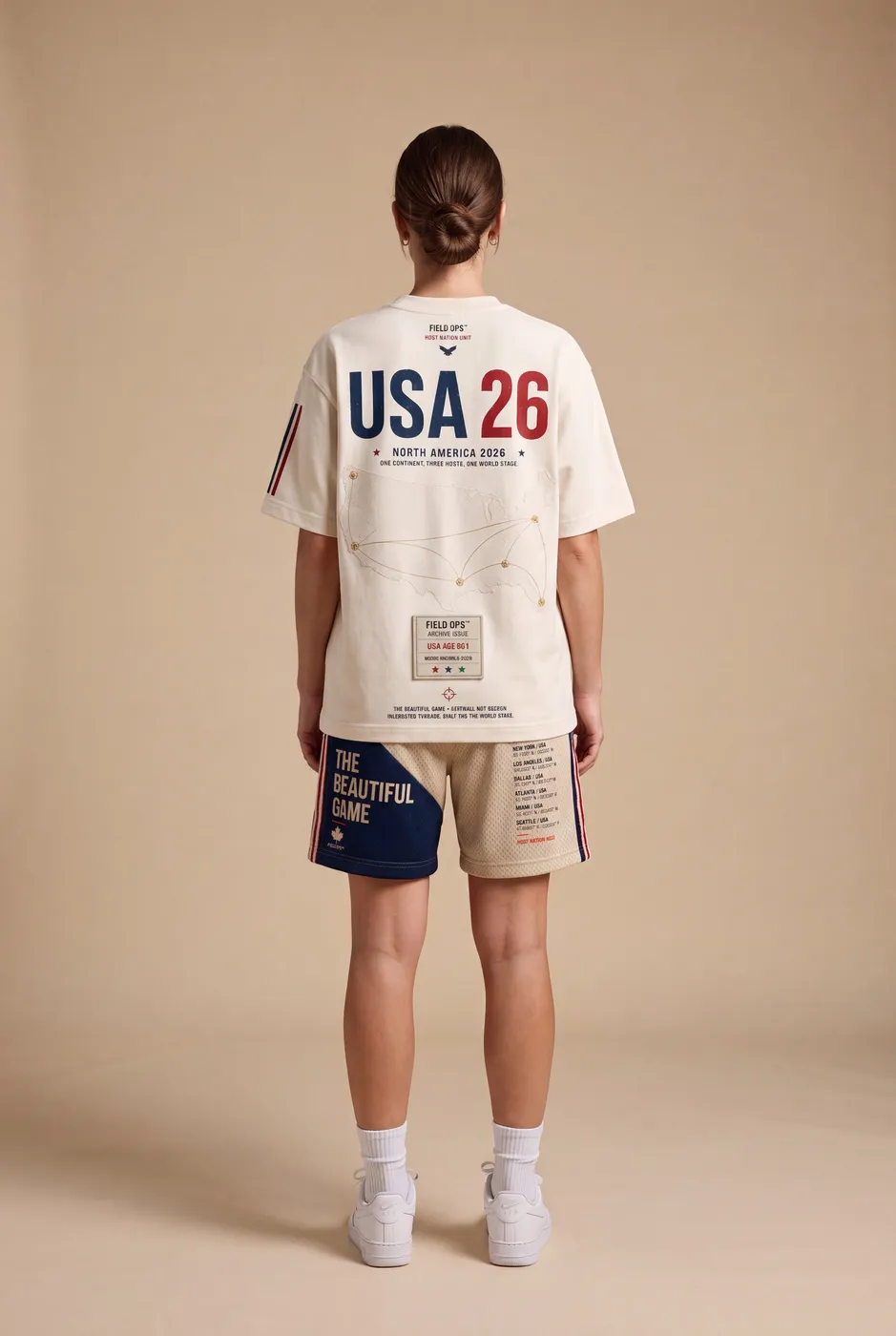 Host Nation USA tee worn on model, studio back.